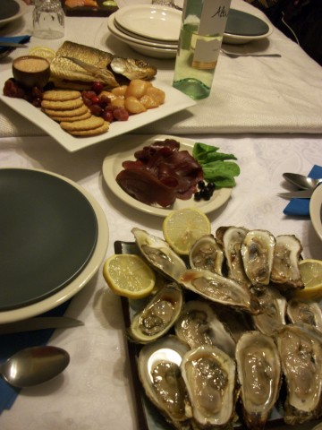 Food isn't always a "master/servant" dynamic, it can also be a potlach or gathering and pooling of resources, like my dinner club. Here we try oysters, smoked venison, smoked white fish, smoked scallops, berries and dried berries, caviar and arctic char sashimi that didn't fit in the photo. What happens when all are contributing! 